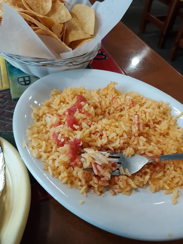 Spanish Rice with 0 Flavor Had to Put Salsa on It to Flavor It Up